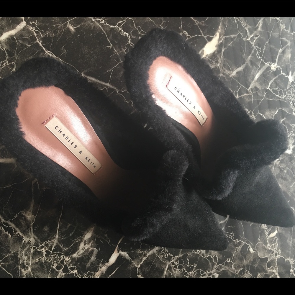 Black furry slip-on with stiletto heel